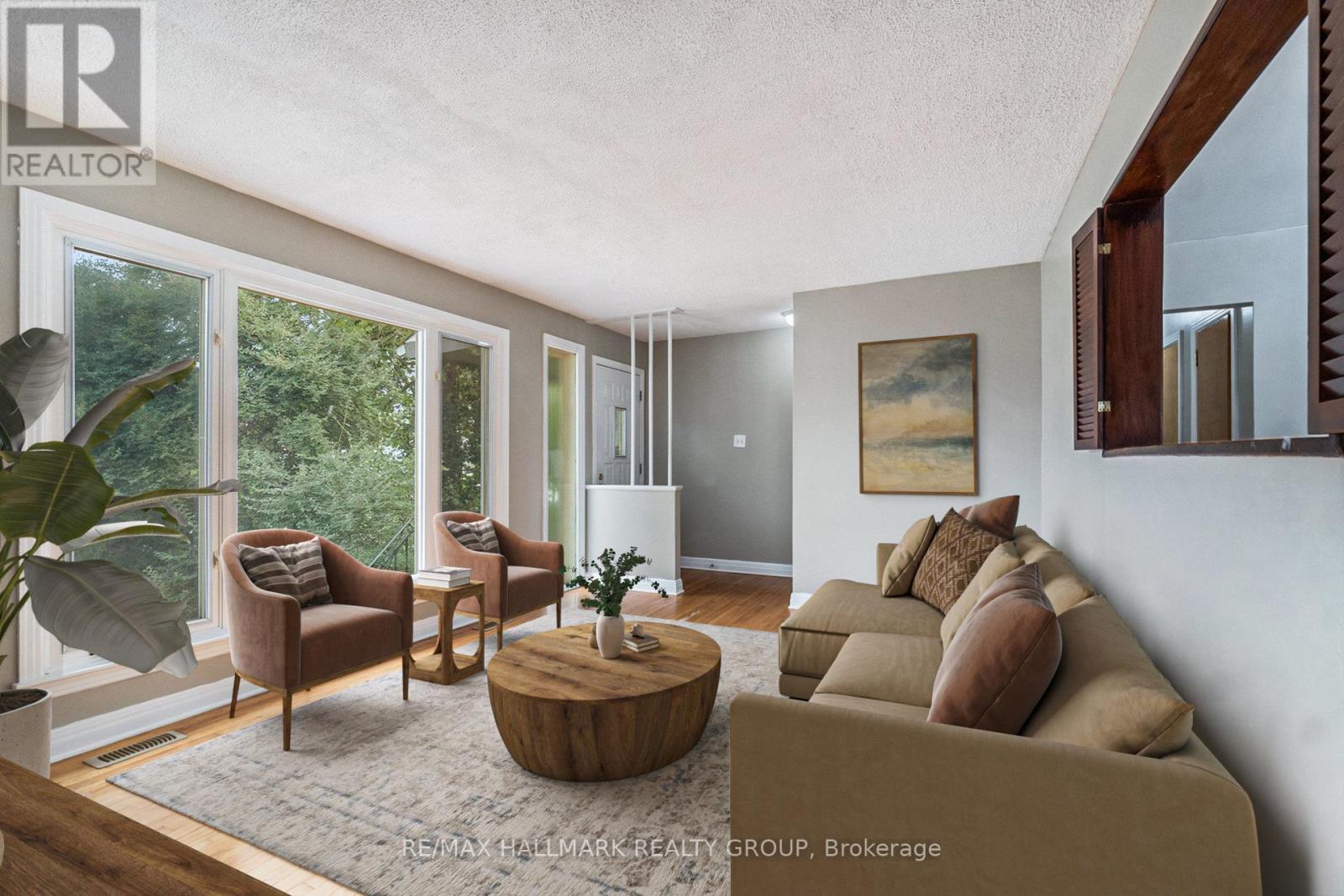 Unit 1 living virtually staged - 426 Blake Boulevard, Ottawa, ON - Indoor Photo Showing Living Room