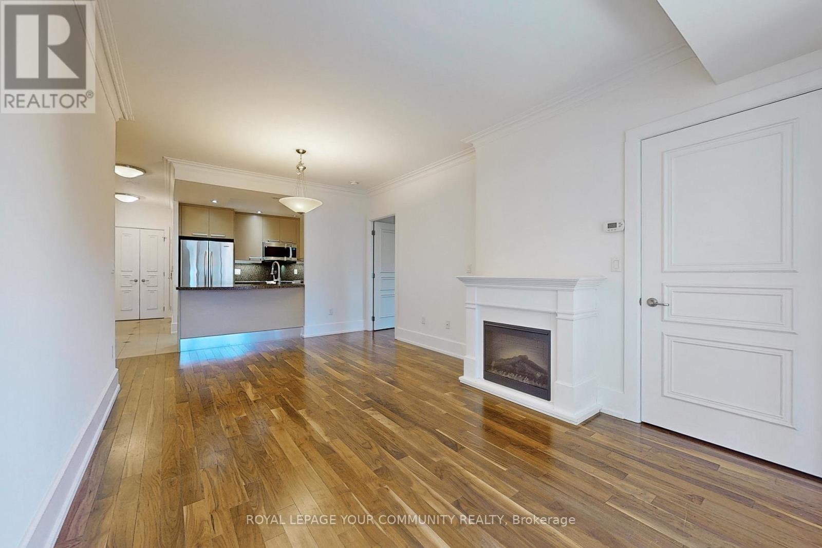 603C - 662 Sheppard Avenue E, Toronto, ON - Indoor Photo Showing Living Room With Fireplace