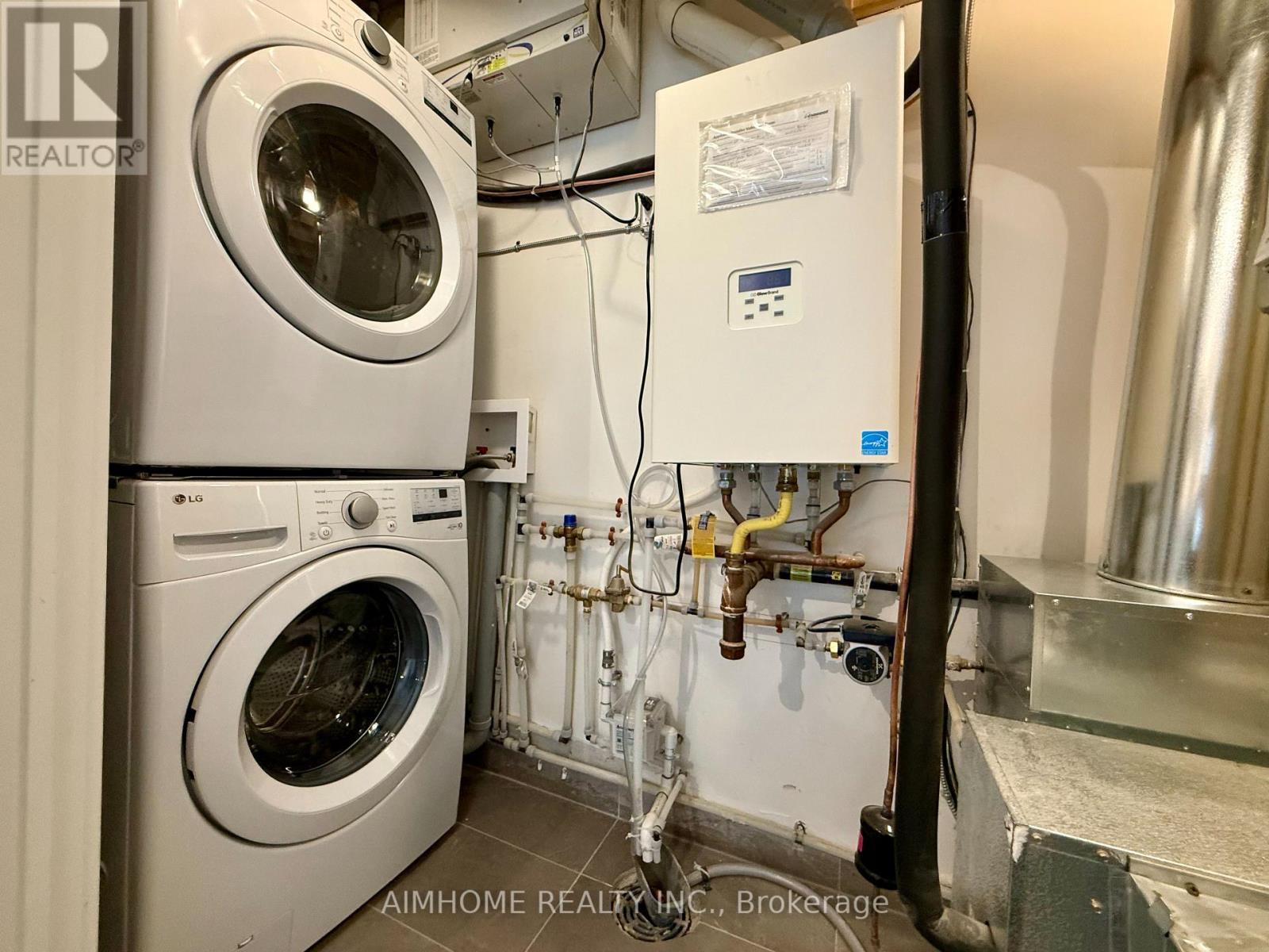 141 - 69 Curlew Drive, Toronto, ON - Indoor Photo Showing Laundry Room