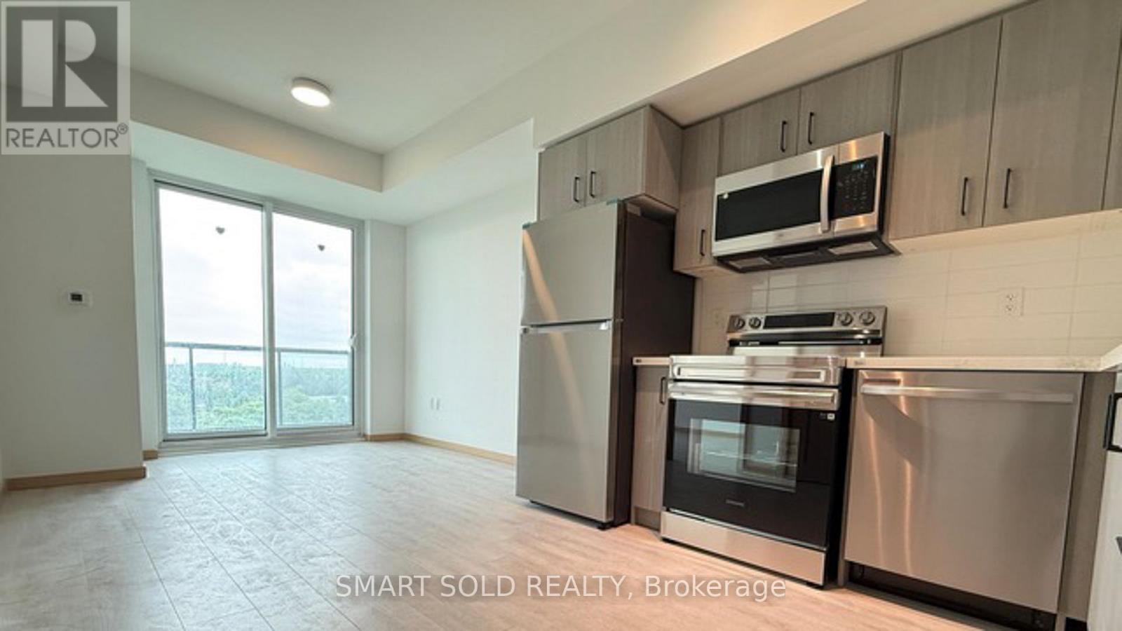 B720 - 3429 Sheppard Avenue E, Toronto, ON - Indoor Photo Showing Kitchen With Stainless Steel Kitchen