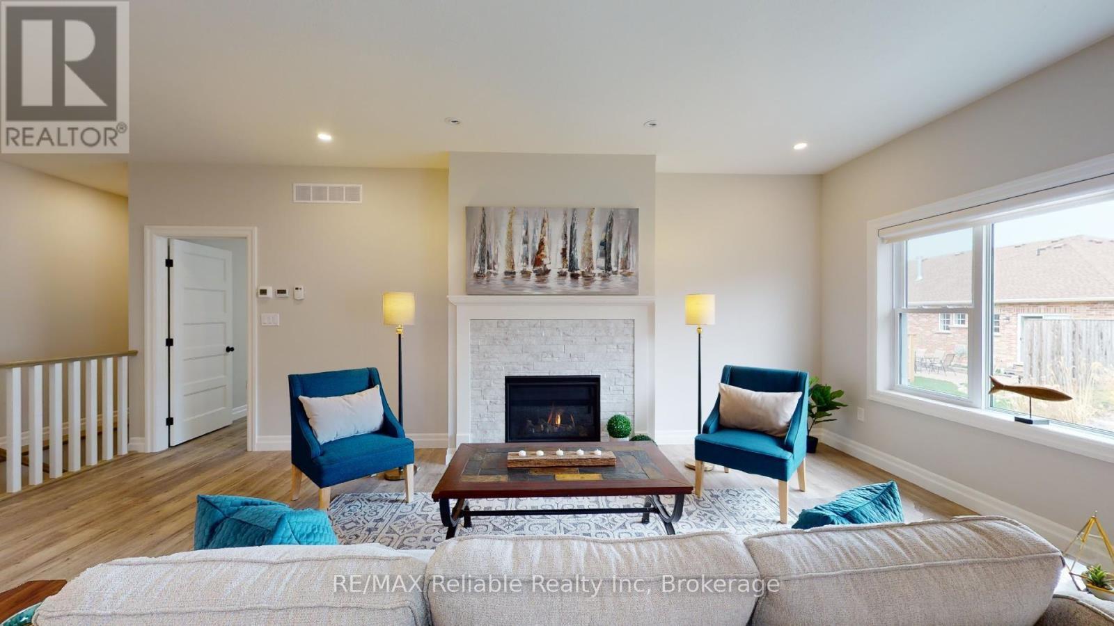 7 Thimbleweed Drive, Bluewater (Bayfield), ON - Indoor Photo Showing Living Room With Fireplace