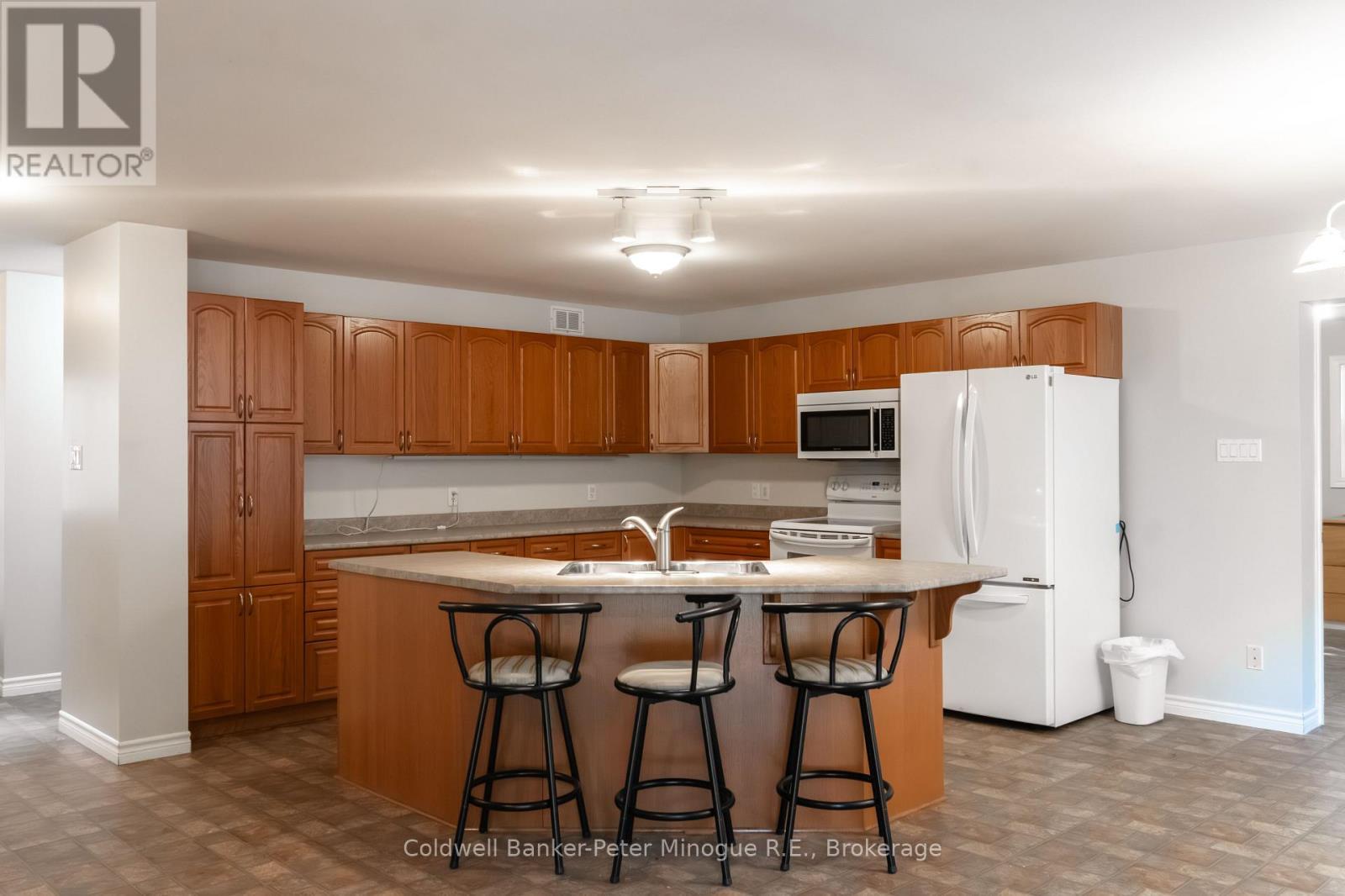 567 Sunset Cove Road, Callander, ON - Indoor Photo Showing Kitchen With Double Sink