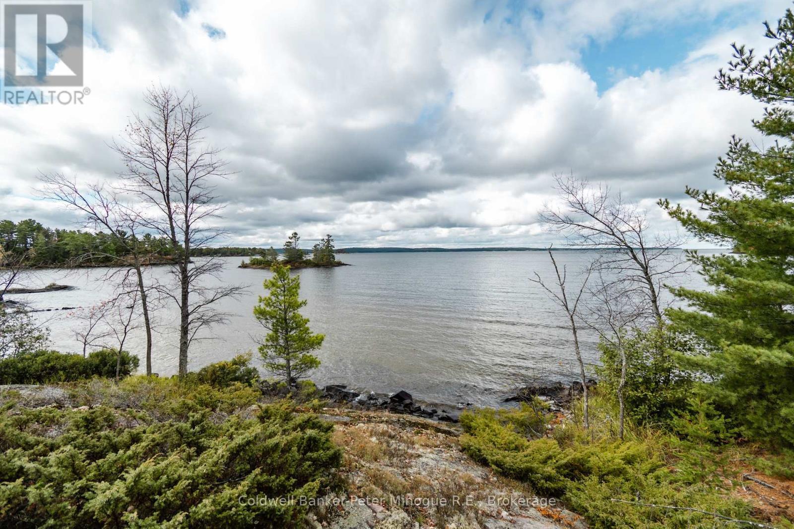 567 Sunset Cove Road, Callander, ON - Outdoor With Body Of Water With View
