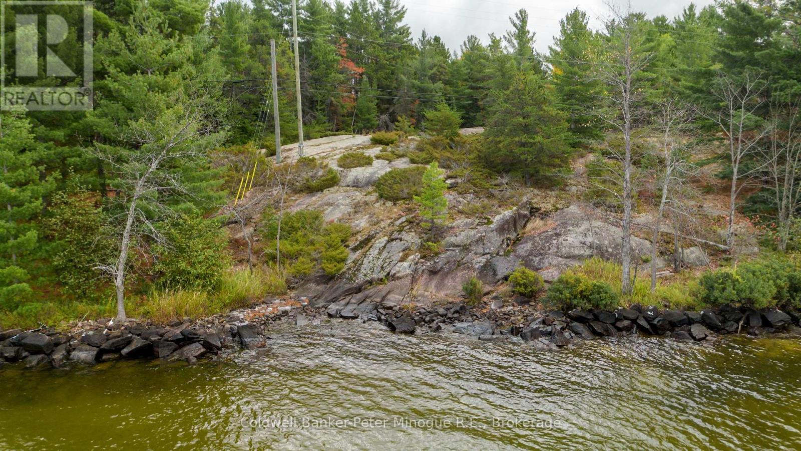 567 Sunset Cove Road, Callander, ON - Outdoor With Body Of Water With View
