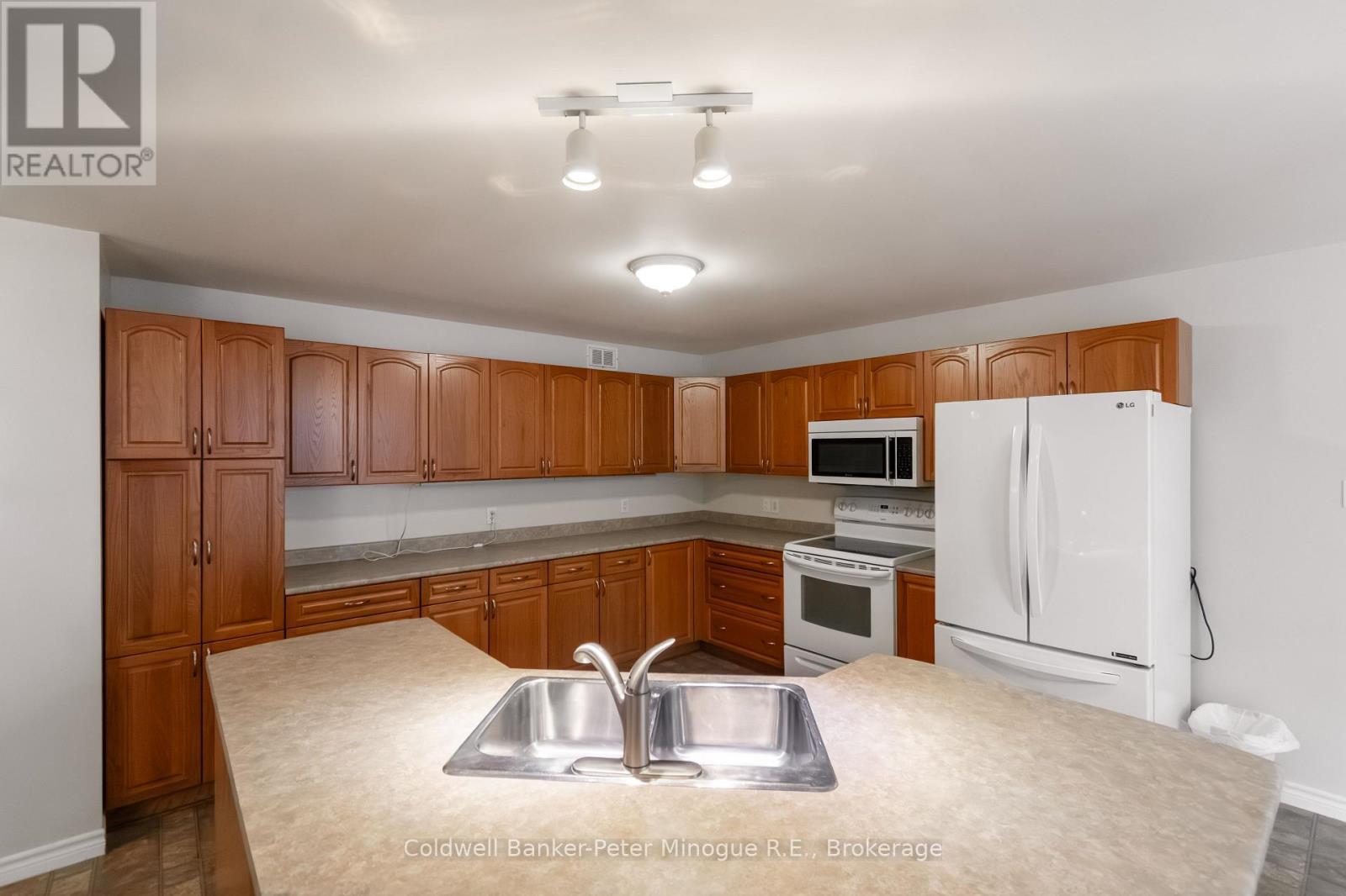 567 Sunset Cove Road, Callander, ON - Indoor Photo Showing Kitchen With Double Sink