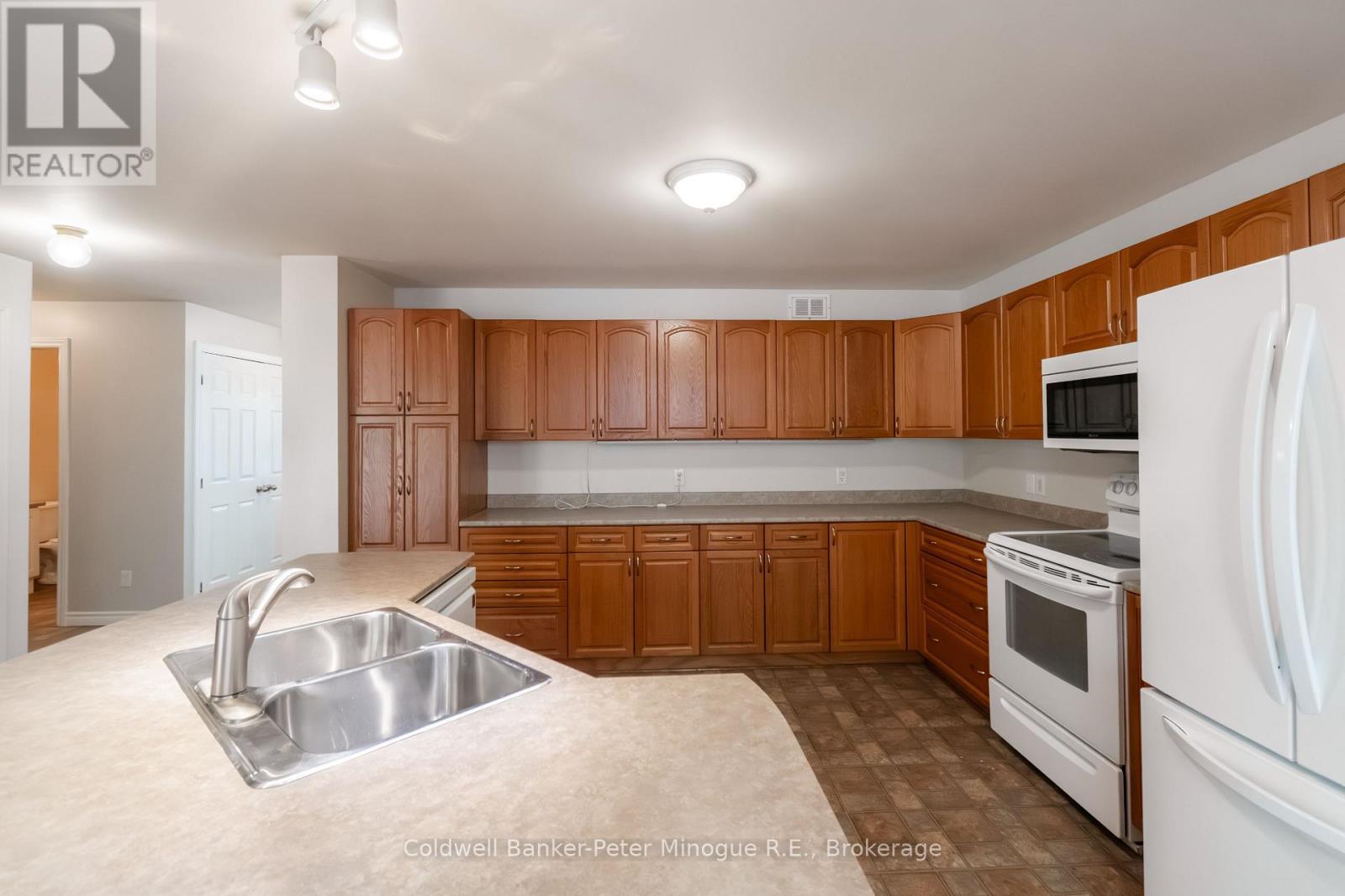 567 Sunset Cove Road, Callander, ON - Indoor Photo Showing Kitchen With Double Sink