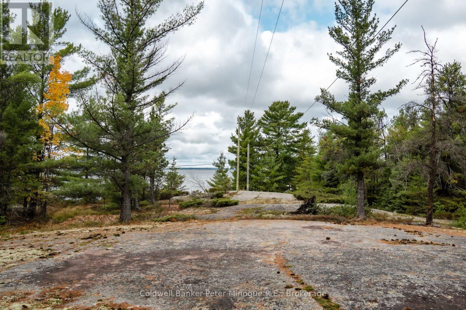 to the waterfront - 567 Sunset Cove Road, Callander, ON - Outdoor With View