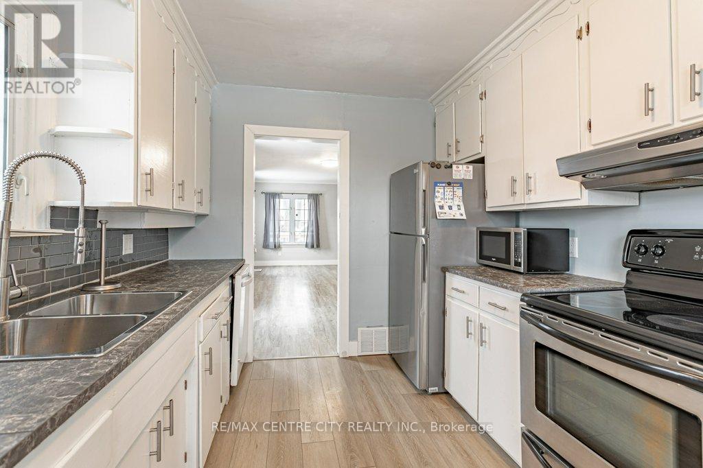 1305 Langmuir Avenue, London East (East N), ON - Indoor Photo Showing Kitchen With Double Sink