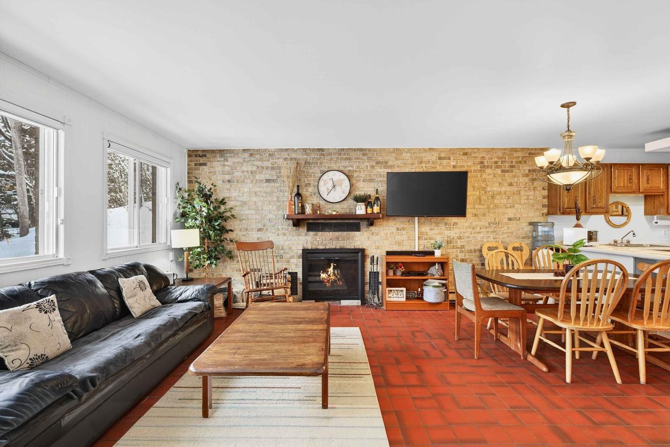 Living room - 117 Rue Ladouceur, Mont-Tremblant, QC - Indoor Photo Showing Living Room With Fireplace