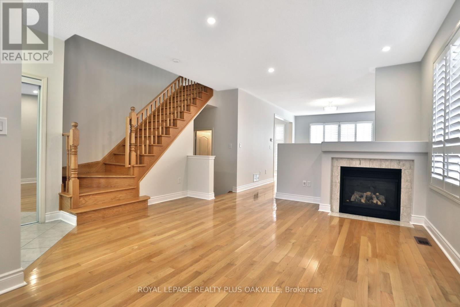 2565 Falkland Crescent, Oakville, ON - Indoor Photo Showing Living Room With Fireplace