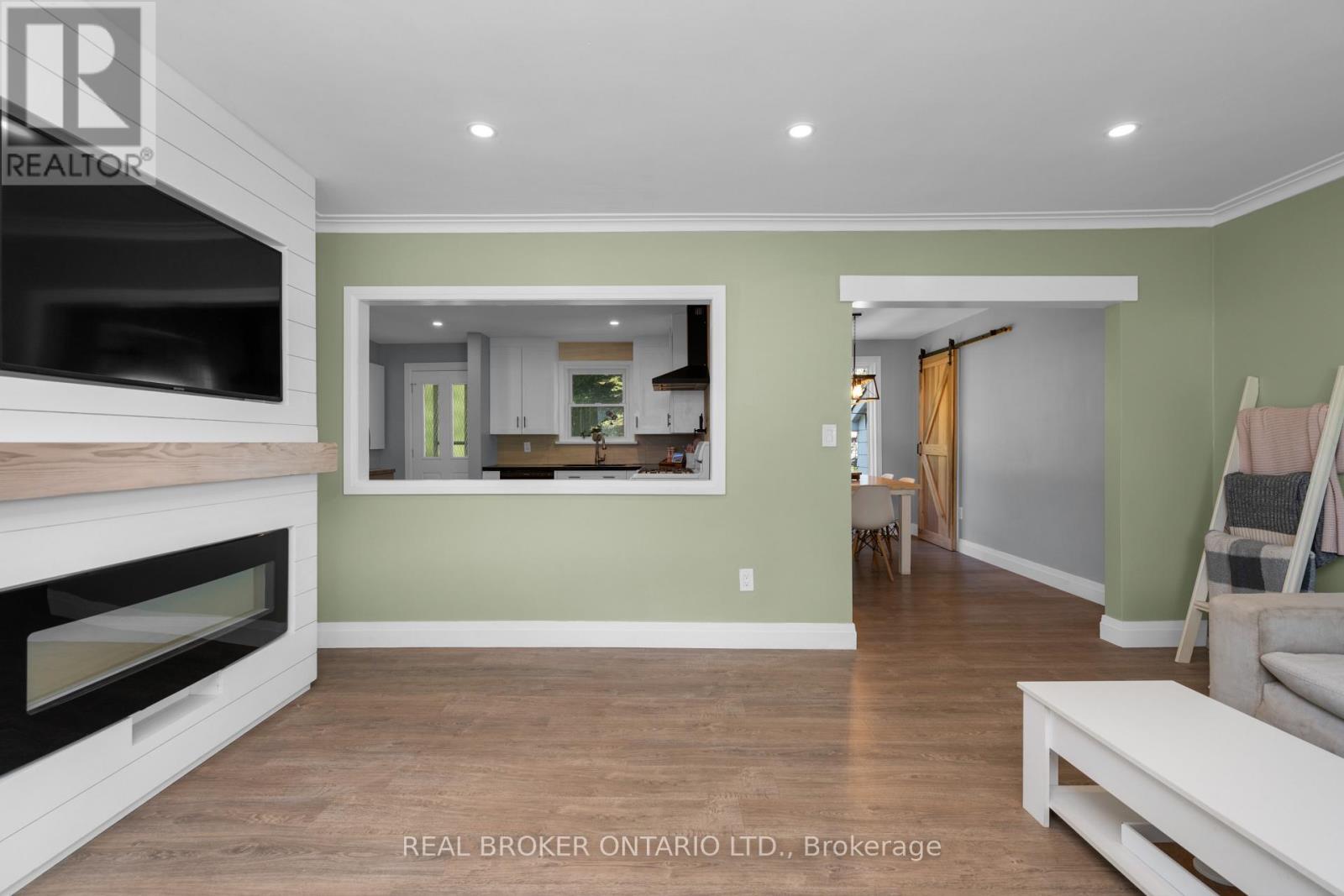 7978 Main Street, Adjala-Tosorontio, ON - Indoor Photo Showing Living Room With Fireplace