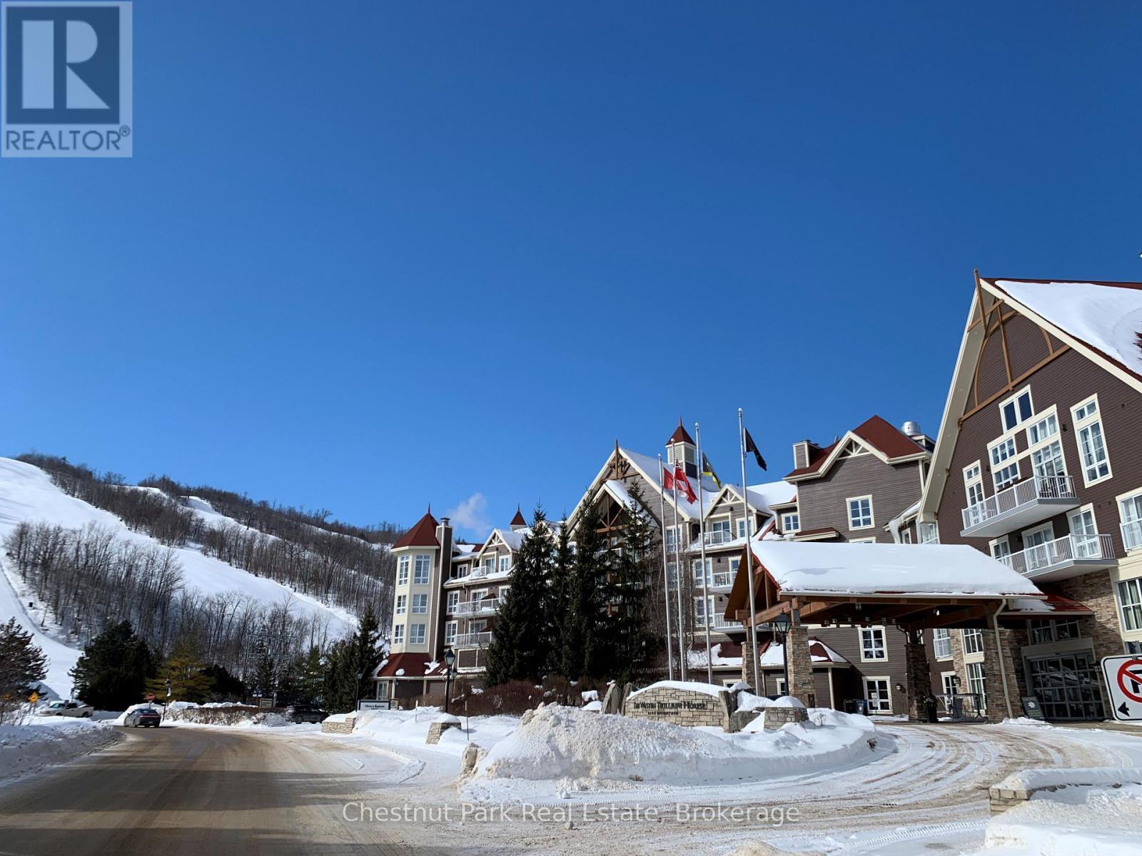 307 - 220 Gord Canning Drive, Blue Mountains, ON - Outdoor With Facade