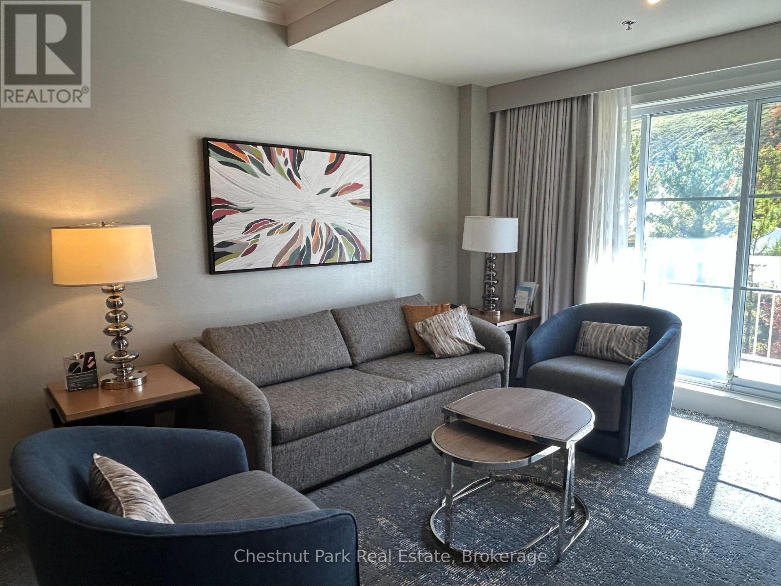 307 - 220 Gord Canning Drive, Blue Mountains, ON - Indoor Photo Showing Living Room