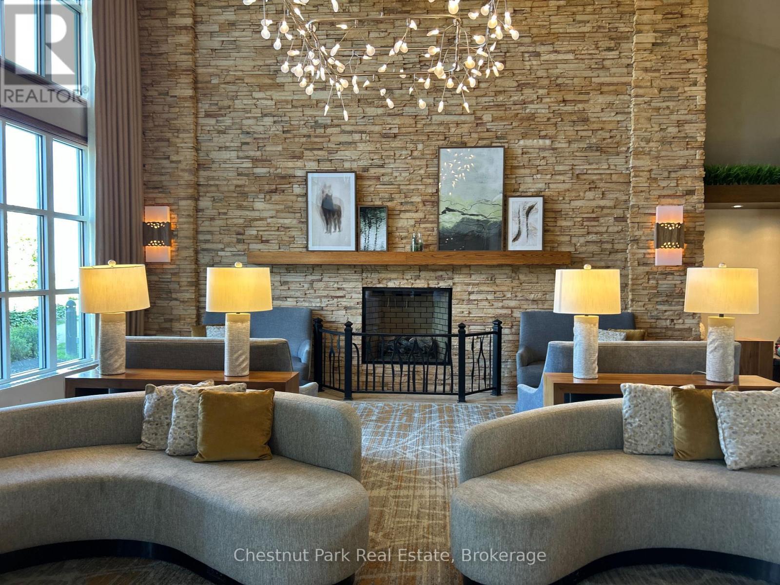 Westin lobby - 307 - 220 Gord Canning Drive, Blue Mountains, ON - Indoor Photo Showing Living Room With Fireplace