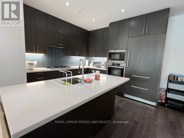 908 - 29 Queens Quay E, Toronto, ON - Indoor Photo Showing Kitchen With Double Sink With Upgraded Kitchen