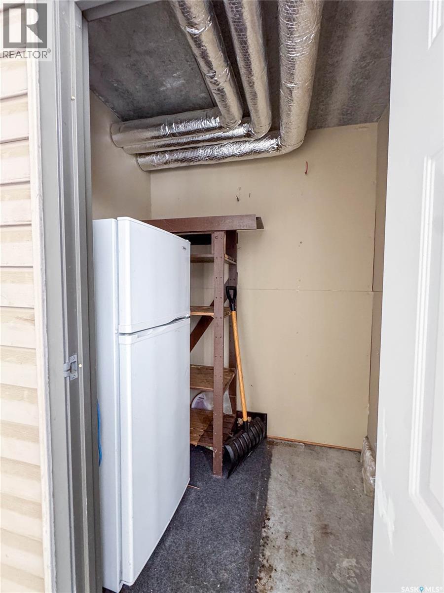 202 1901 1 1/2 Avenue W, Prince Albert, SK - Indoor Photo Showing Basement