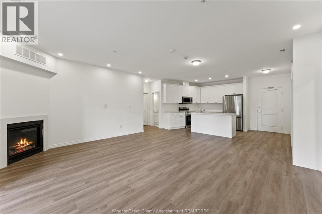 1888 Westview Park Boulevard Unit# 114, Lasalle, ON - Indoor With Fireplace