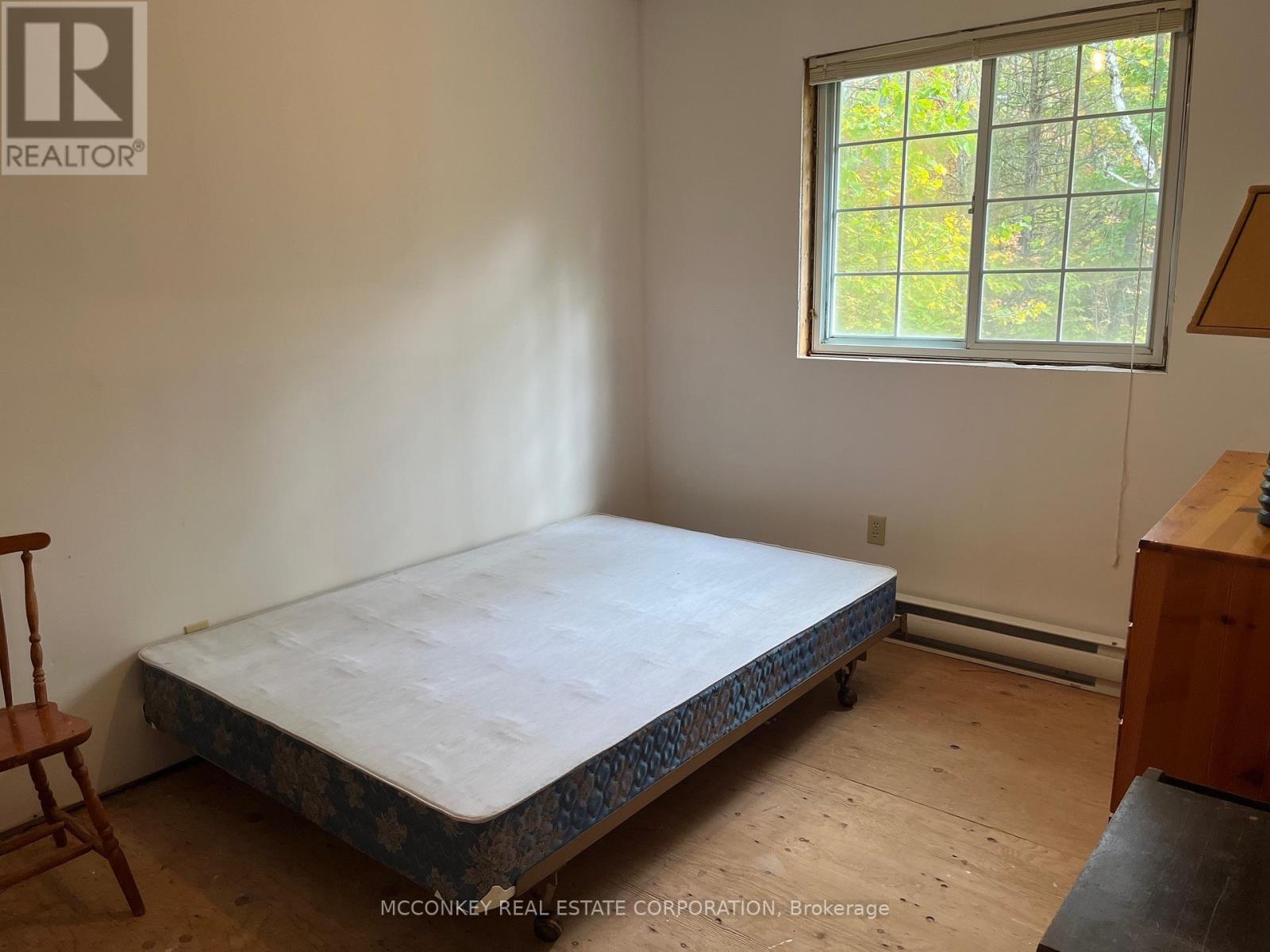 2370 Julia Shore Road E, Douro-Dummer, ON - Indoor Photo Showing Bedroom