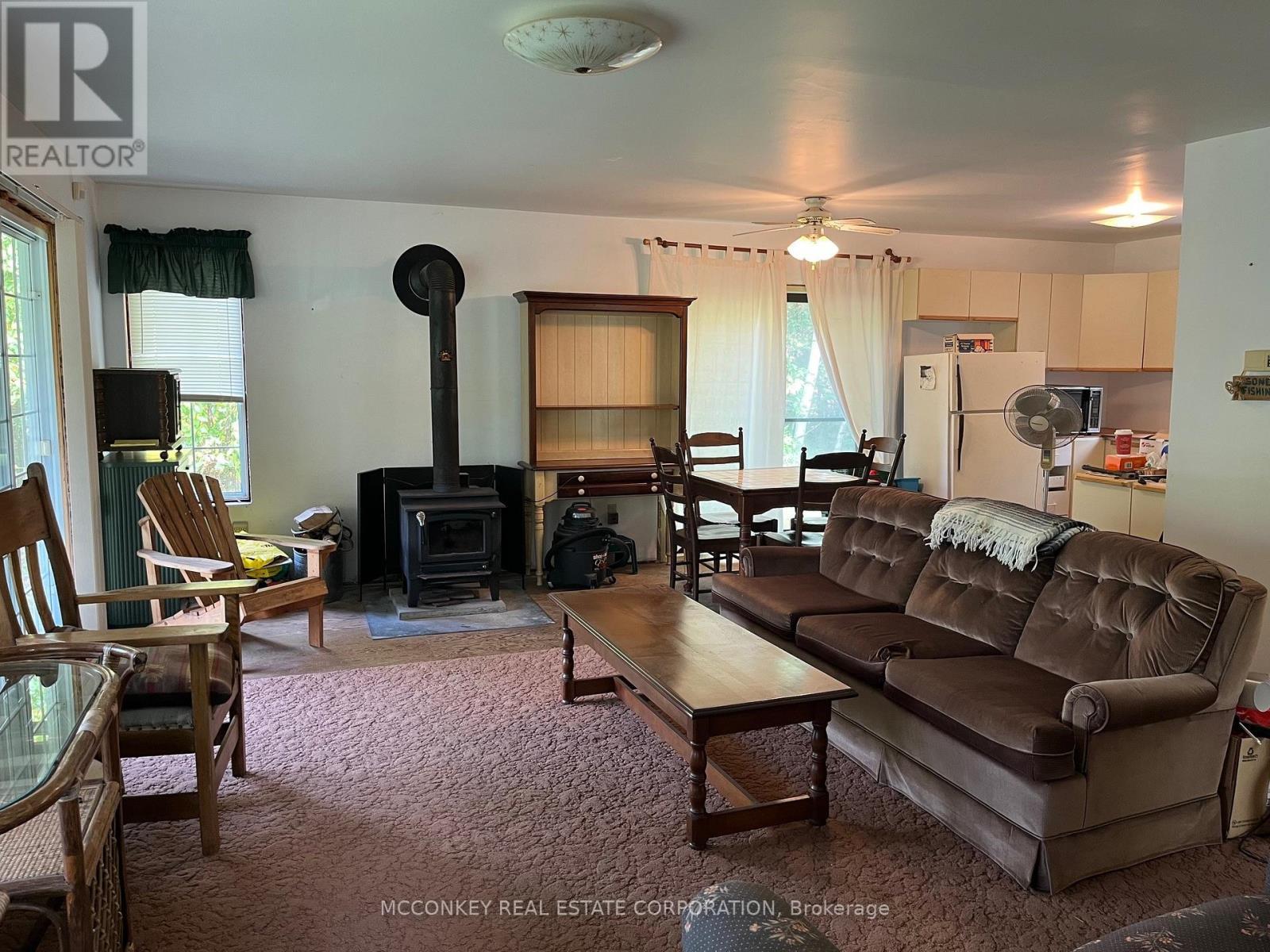 2370 Julia Shore Road E, Douro-Dummer, ON - Indoor Photo Showing Living Room With Fireplace