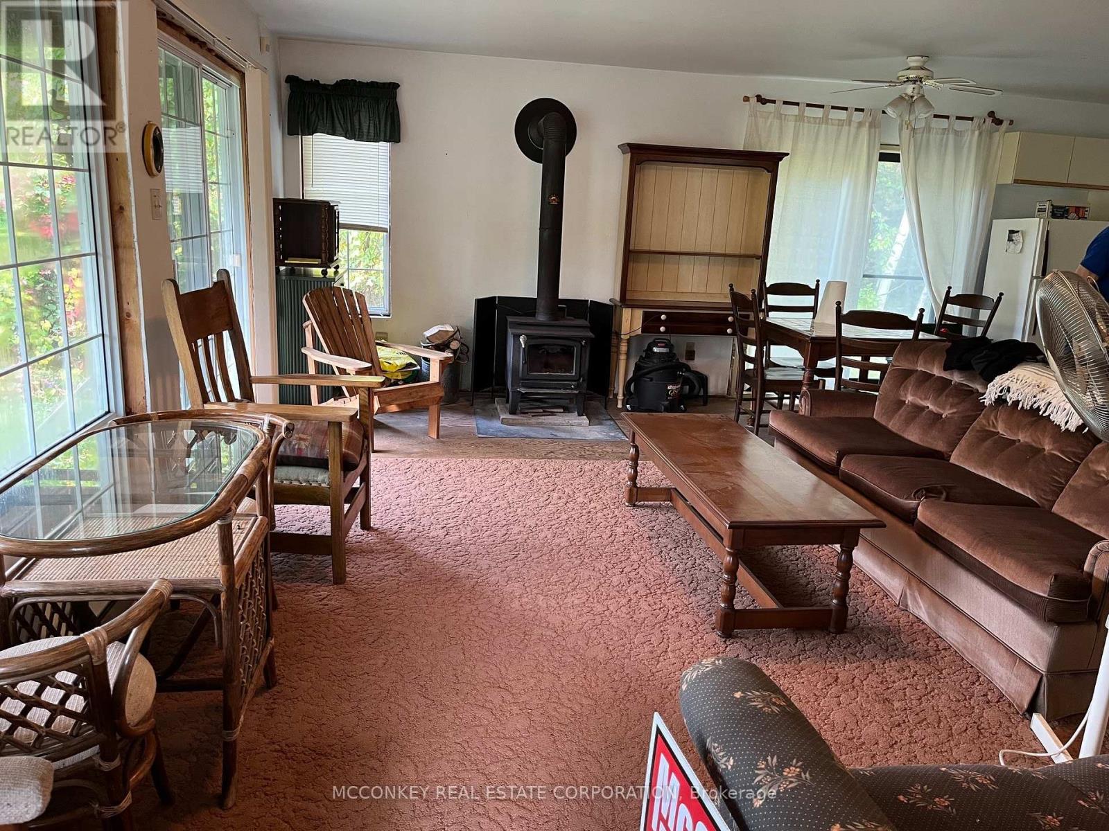 2370 Julia Shore Road E, Douro-Dummer, ON - Indoor With Fireplace