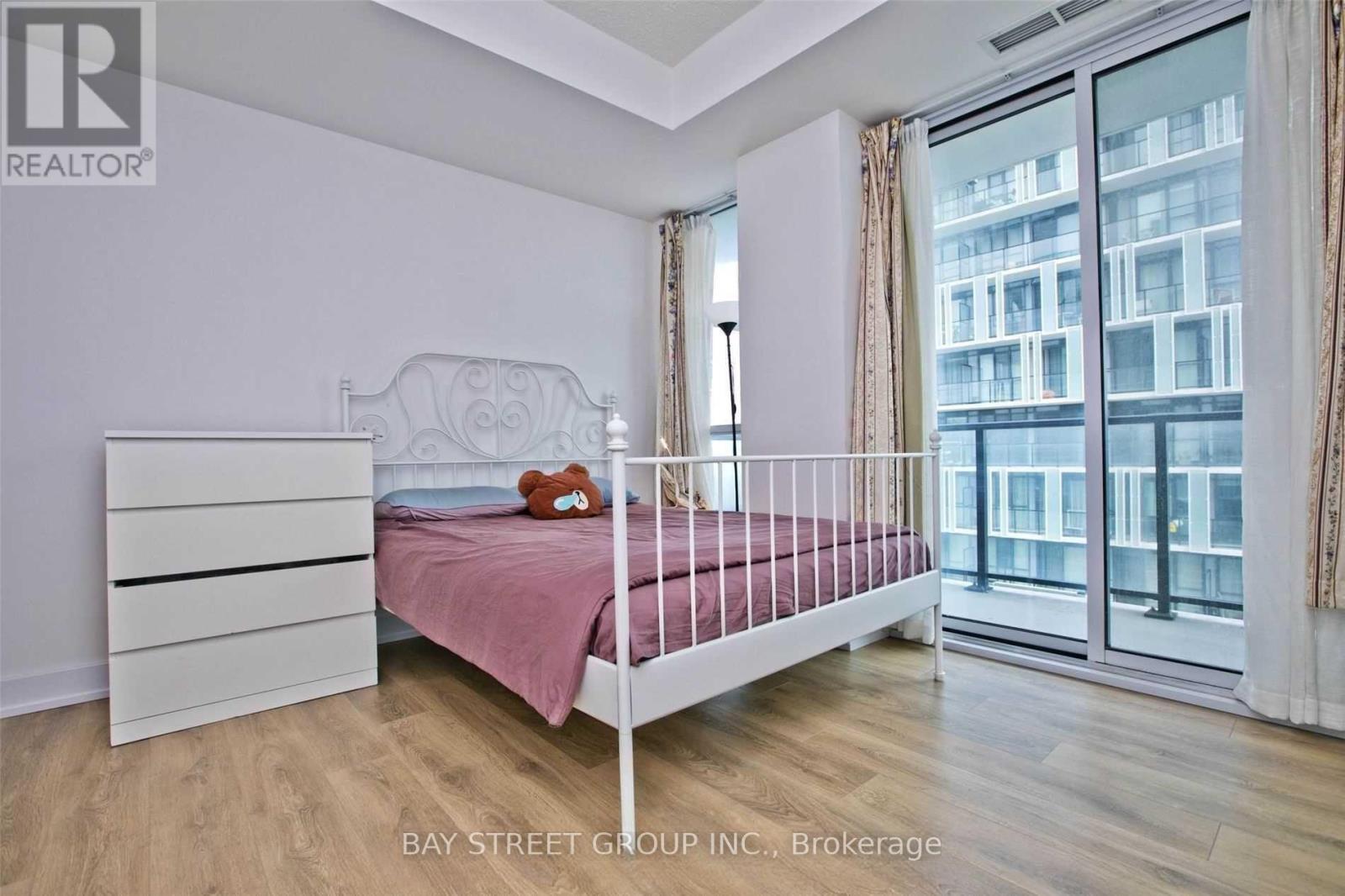 1211 - 128 Fairview Mall Drive, Toronto, ON - Indoor Photo Showing Bedroom