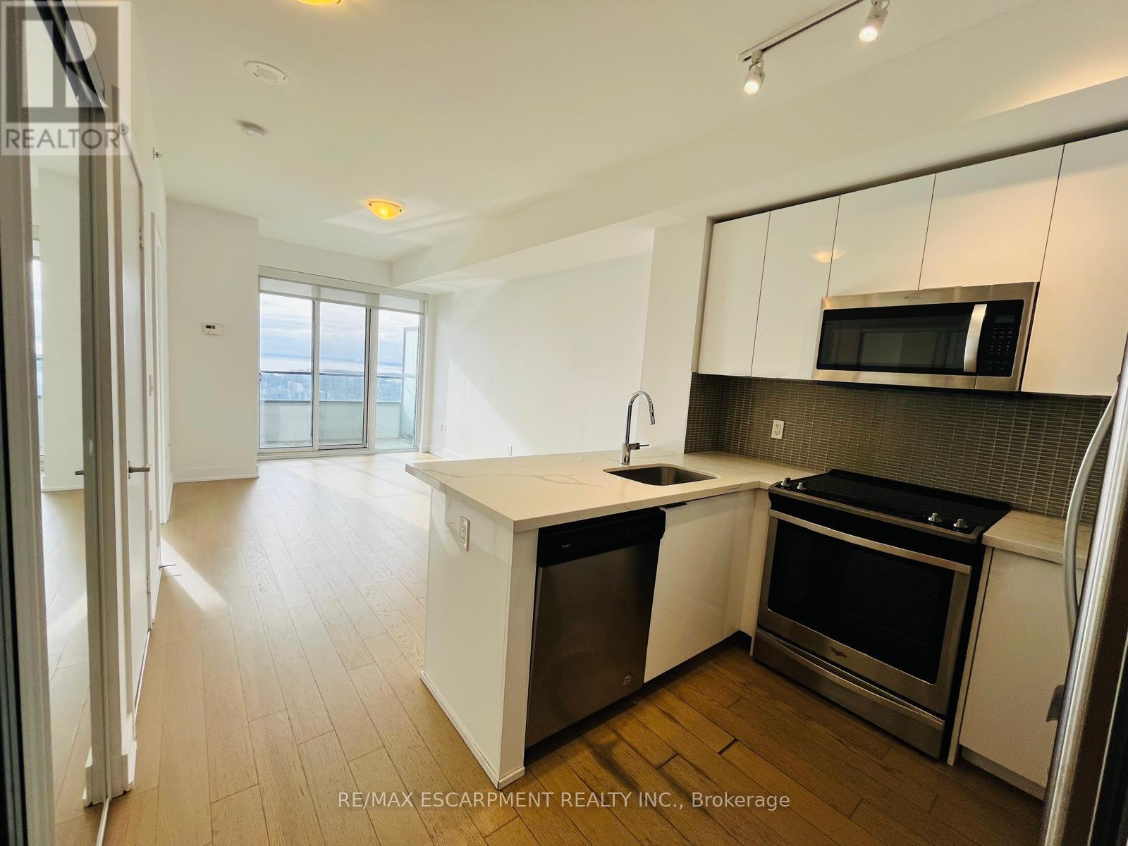 3911 - 20 Shore Breeze Drive, Toronto, ON - Indoor Photo Showing Kitchen