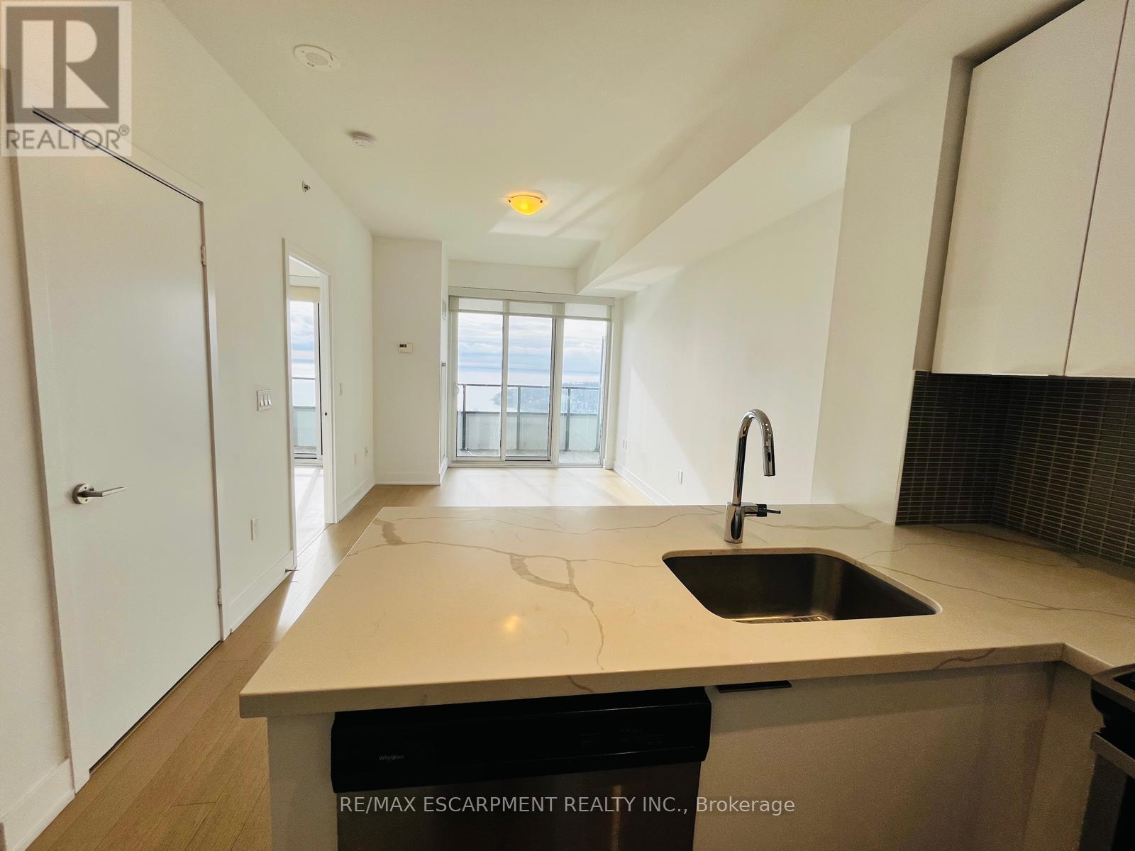 3911 - 20 Shore Breeze Drive, Toronto, ON - Indoor Photo Showing Kitchen