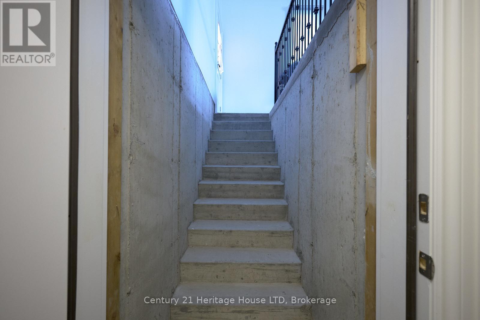 Walk-up from basement to garage - 17 Biggar Road, Thorold (Port Robinson), ON - Indoor Photo Showing Other Room