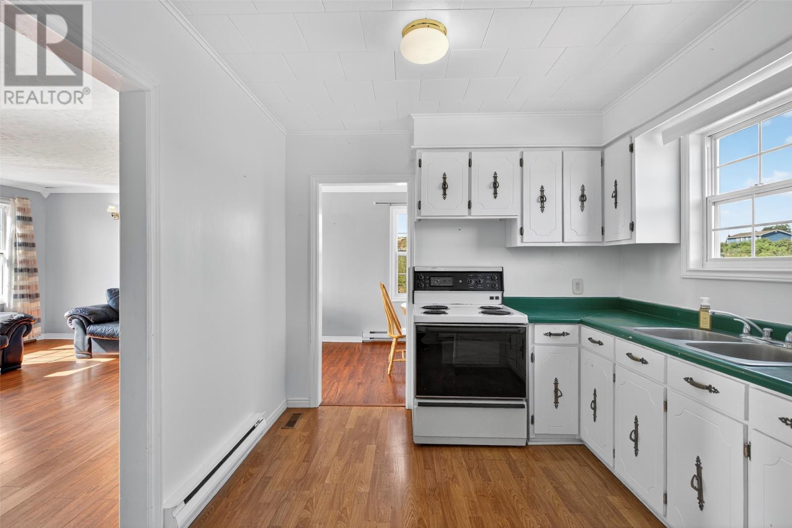 13 Mccarthys Road, Upper Island Cove, NL - Indoor Photo Showing Kitchen With Double Sink
