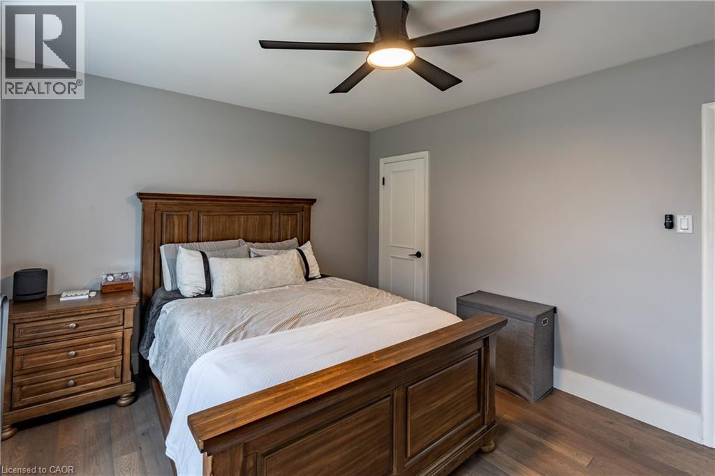 Bedroom with ceiling fan and dark wood-style floors - 266 Melrose Avenue, Kitchener, ON - Indoor Photo Showing Bedroom