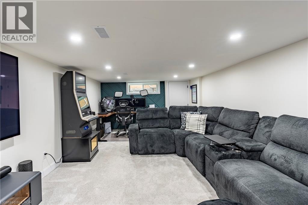 Living room featuring carpet flooring and an office area - 266 Melrose Avenue, Kitchener, ON - Indoor