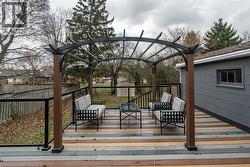 Wooden terrace with an outdoor living space -