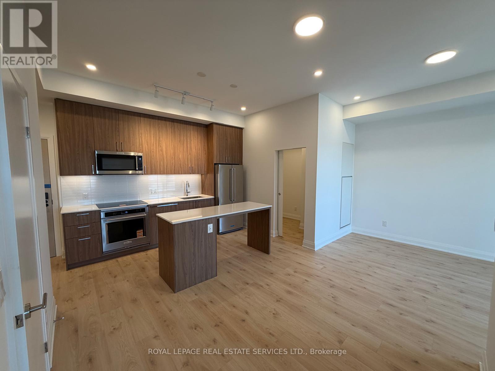 516 - 3250 Carding Mill Trail, Oakville, ON - Indoor Photo Showing Kitchen