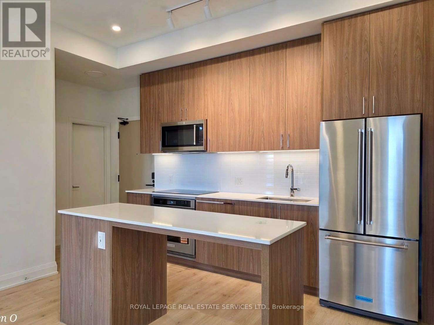 516 - 3250 Carding Mill Trail, Oakville, ON - Indoor Photo Showing Kitchen