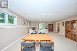 Glass doors frame unobstructed views of the ravine -