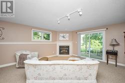 Centred around a contemporary gas fireplace -