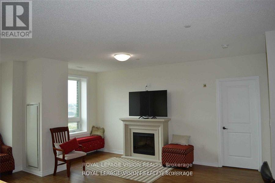 605 - 7400 Markham Road, Markham, ON - Indoor With Fireplace