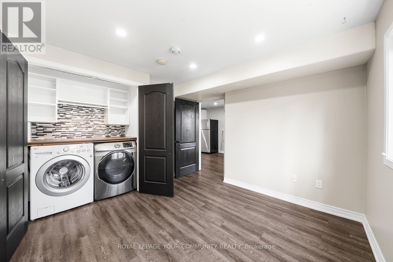 Lower - 1821 Lamstone Street, Innisfil, ON - Indoor Photo Showing Laundry Room