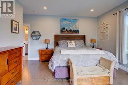 Primary suite with walk-in closet around corner -