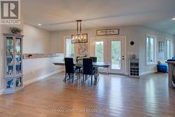 Dining room with walk-out to elevated back deck -