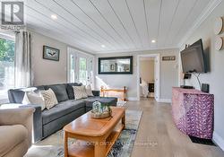 New shiplap ceilings w/ pot lights & eng. hardwood -