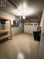 Garage featuring a garage door opener -