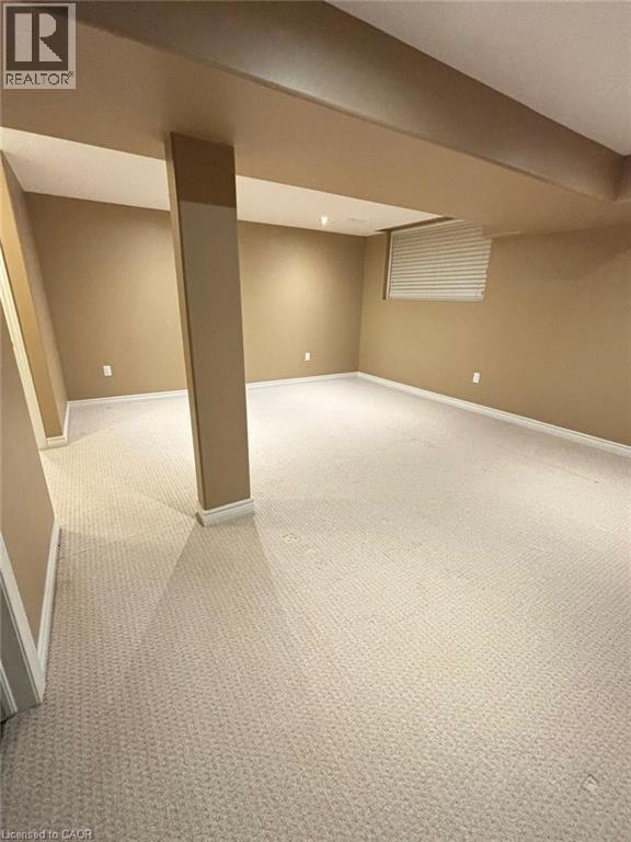 Finished below grade area featuring carpet flooring and baseboards - 6 Chestnut Drive Unit# 16, Grimsby, ON - Indoor