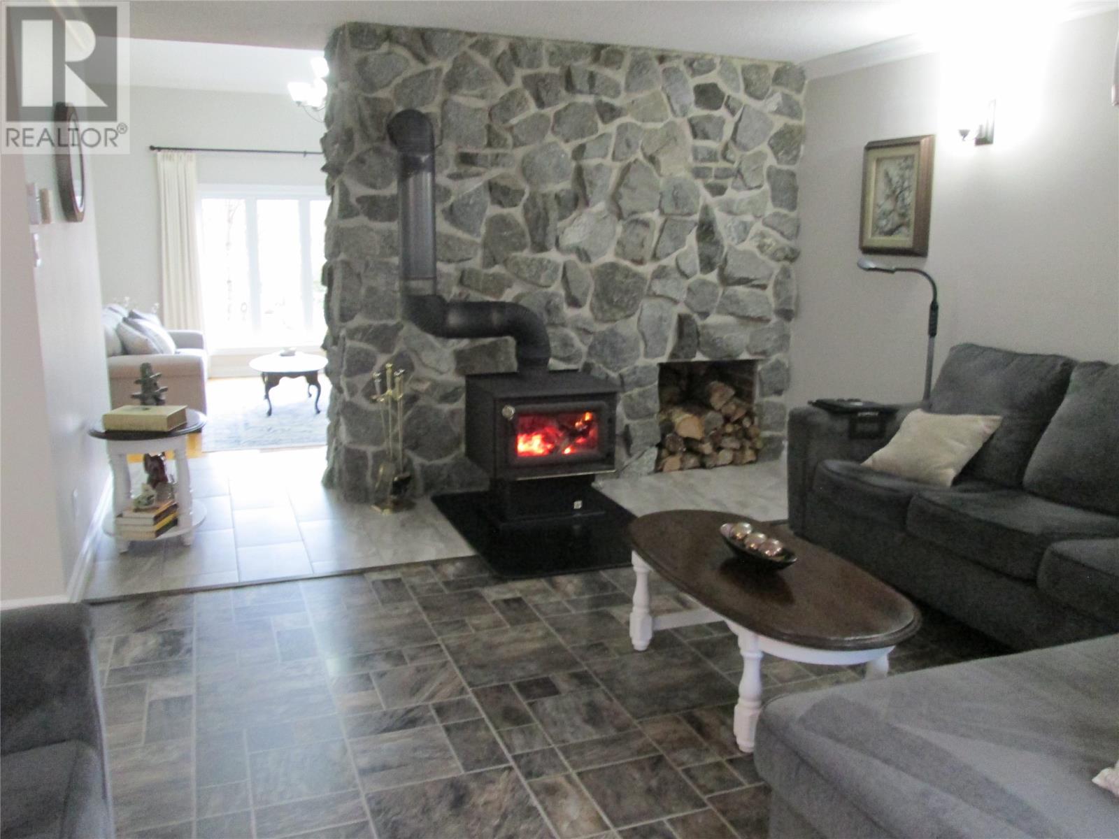 19 Voyce Cove Road, St.Albans, NL - Indoor Photo Showing Living Room With Fireplace