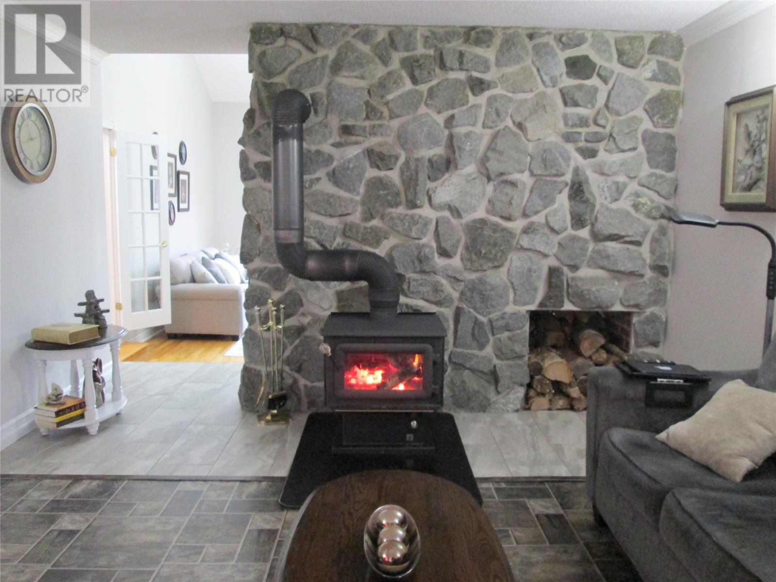 19 Voyce Cove Road, St.Albans, NL - Indoor With Fireplace