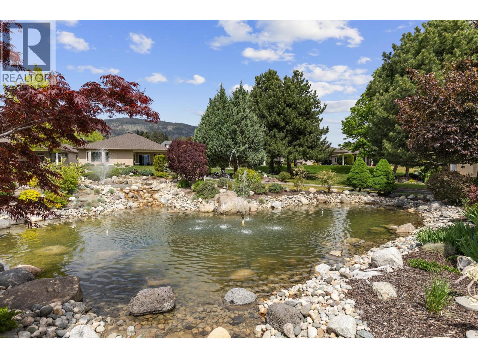 Leisure Village - Common Space & Gardens - 3360 Old Okanagan Highway Unit# 160, West Kelowna, BC - Outdoor With Body Of Water