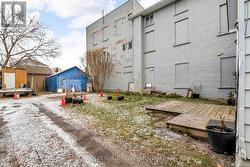 back yard/shared driveway with 2 parking spaces -