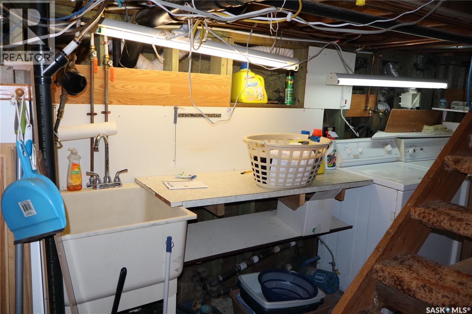 210 1St Avenue, Sutton Rm No. 103, SK - Indoor Photo Showing Laundry Room