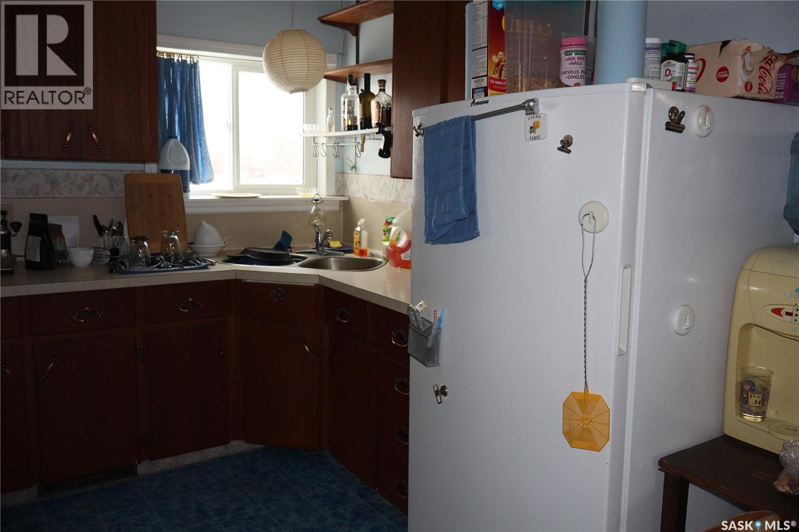210 1St Avenue, Sutton Rm No. 103, SK - Indoor Photo Showing Laundry Room