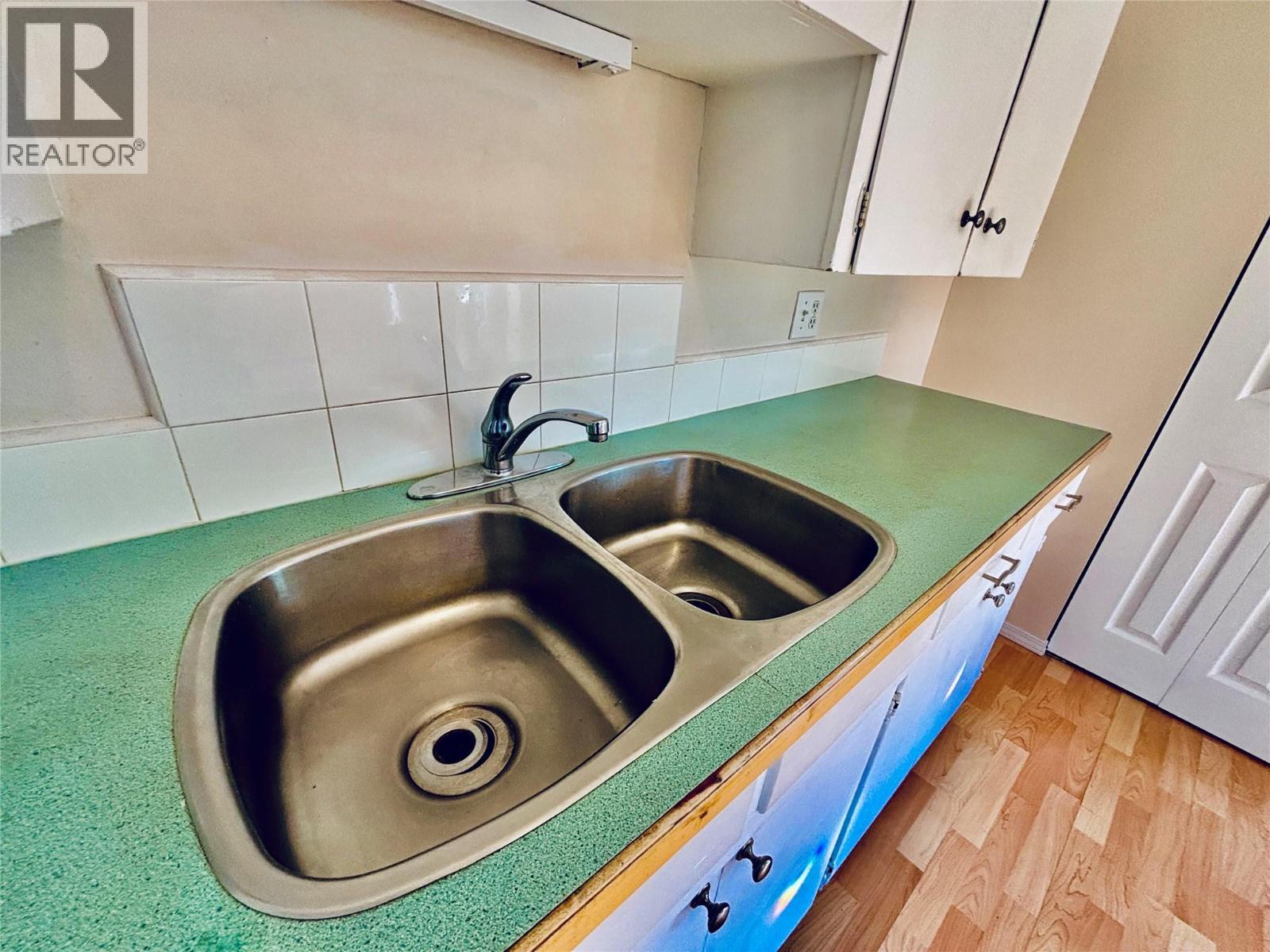 501 Arthur Street, Slocan, BC - Indoor Photo Showing Kitchen With Double Sink